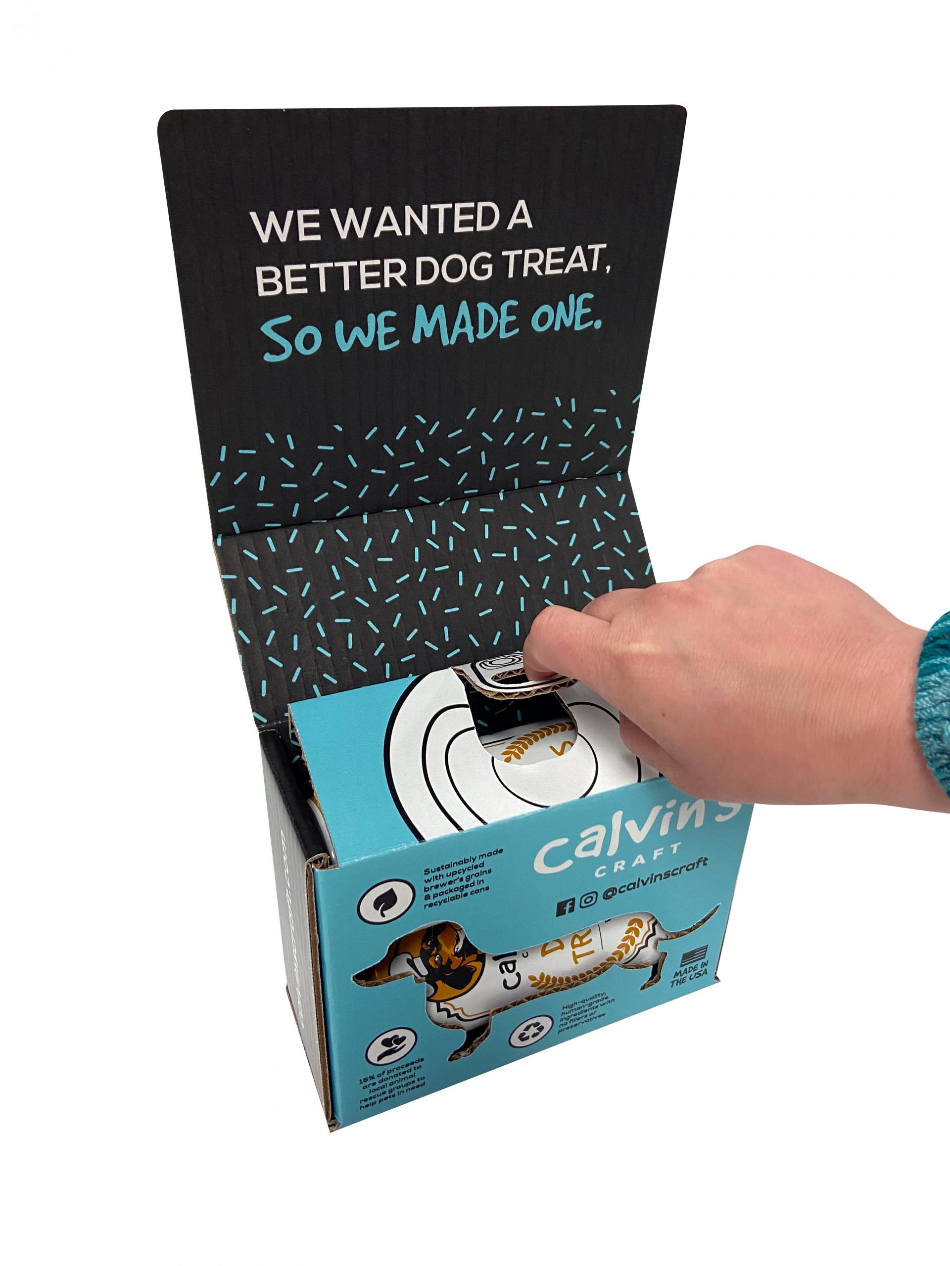 A finger tab is shown being used on a custom corrugated box design by Morrisette Packaging.