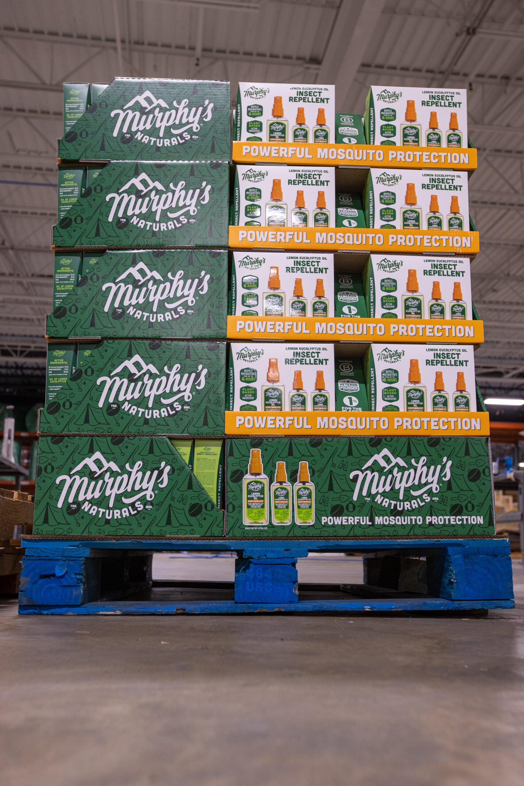 a blue pallet is stacked with Murphy's Naturals insect repellent.