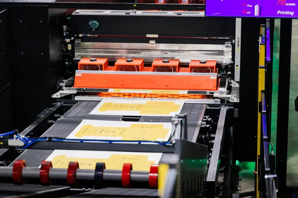 High-speed packaging printing machine manufacturing box templates at Morrisette Packaging