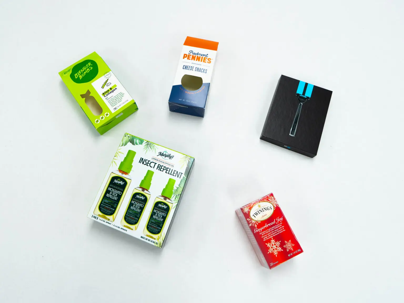 Variety of custom-designed retail packaging products including boxes for supplements, snacks, and personal care